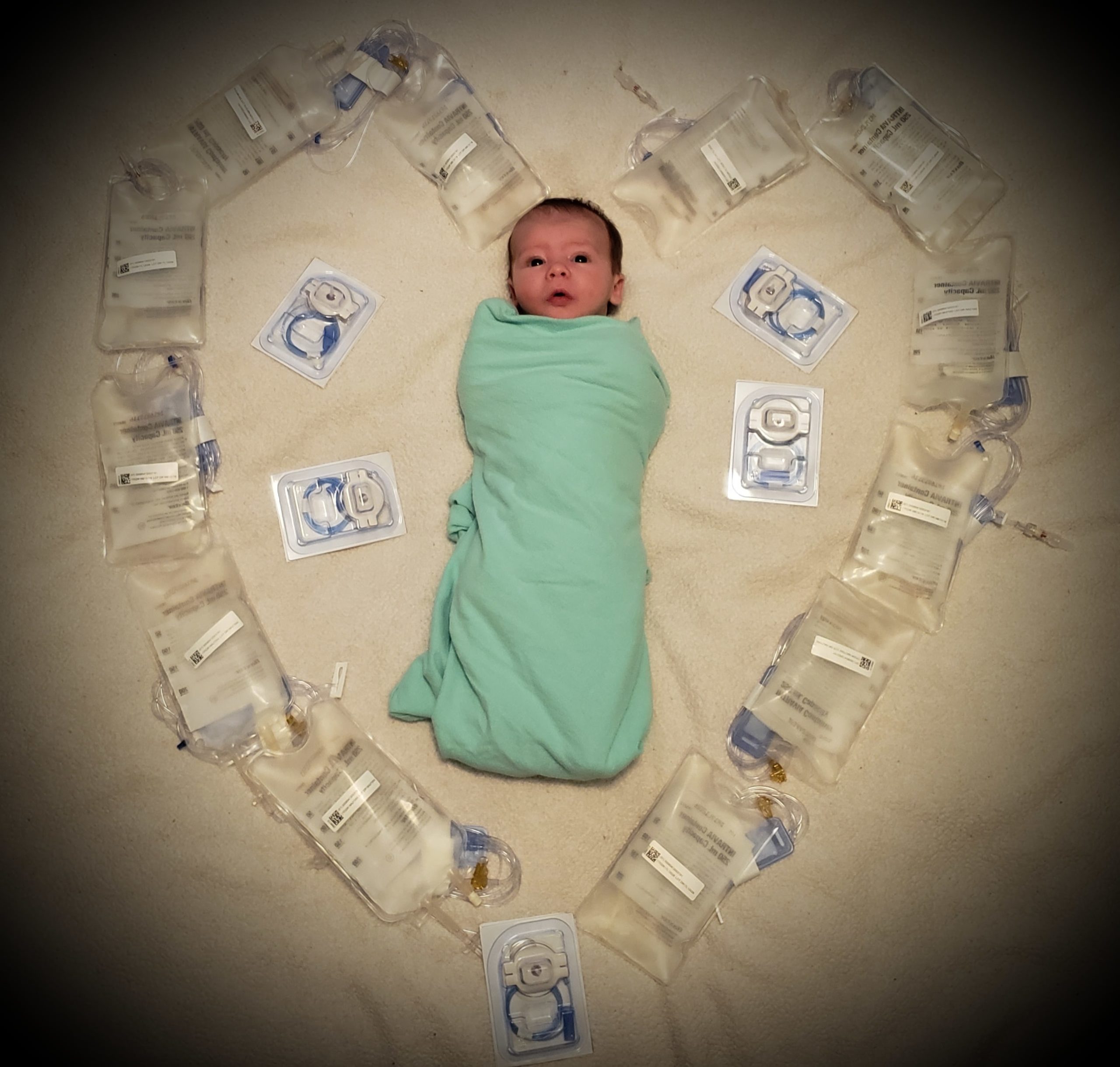 IV bags surrounding baby