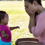 frustrated mom and baby