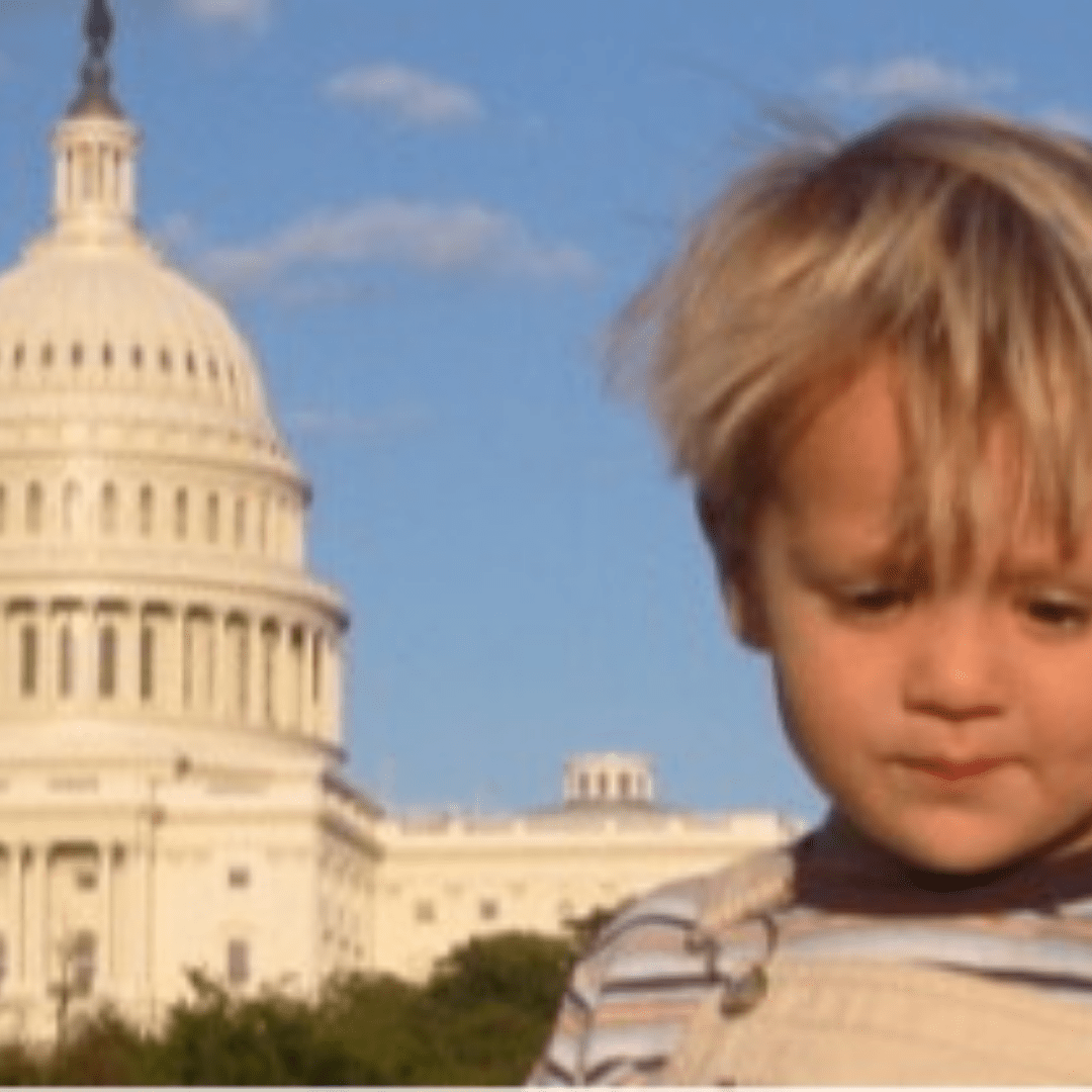 3 yo boy with capital in background