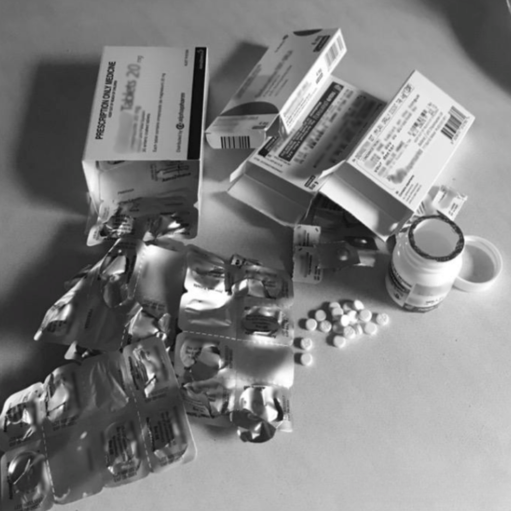 A lot of medications on the table.